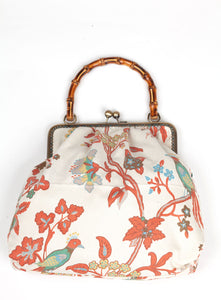 Deep orange floral & bird handbag